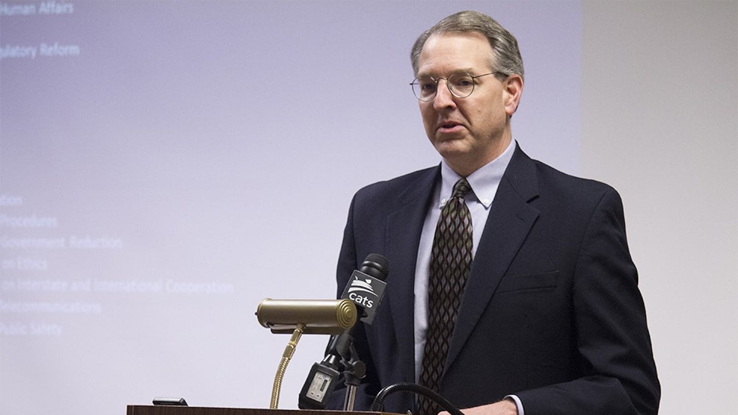 Rep. Matt Pierce, D-Bloomington, explains how the state legislature works during a lecture on Thursday night at Monroe County Public Library.