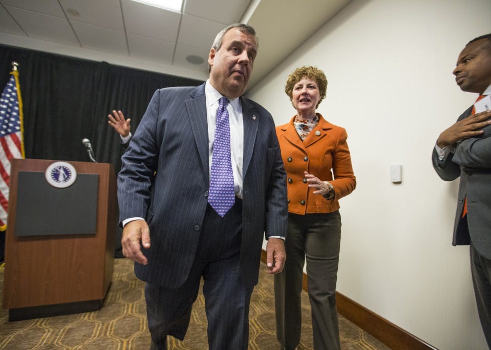 New Jersey Gov. Chris Christie leaves a press conference at the Sheraton Hotel in Indianapolis on Monday. Christie was the keynote speaker at the 8th Annual Prescription Drug Abuse Symposium.