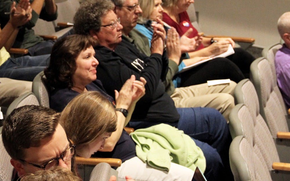 The audience claps for the speakers Wednesday during the conference of the Value of Music Education in School