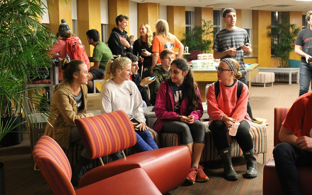 Students talk during an election watch party. Forest Honors Council, part of the Hutton Honors Council Association, provides patriotic cookies and cupcakes to anyone that attended the election night viewing party in the Forest Quad building's Treehouse on Tuesday night.