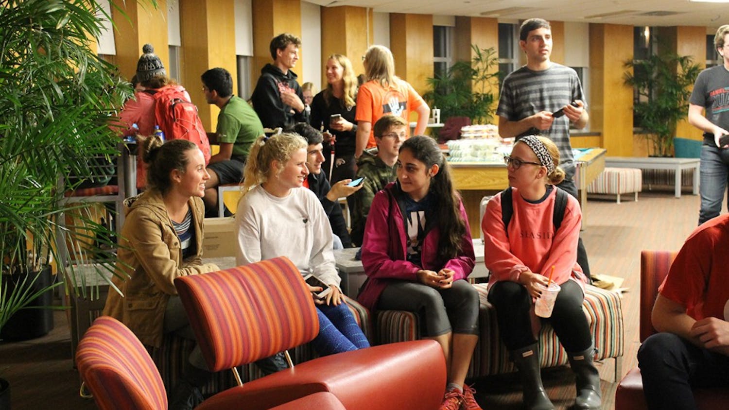 Students talk during an election watch party. Forest Honors Council, part of the Hutton Honors Council Association, provides patriotic cookies and cupcakes to anyone that attended the election night viewing party in the Forest Quad building's Treehouse on Tuesday night.