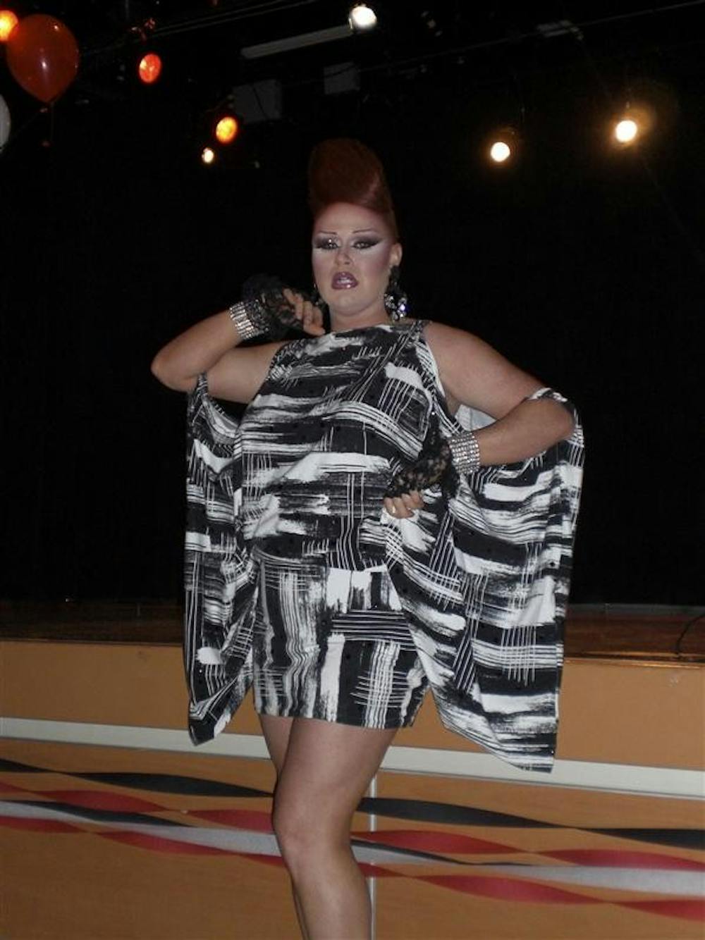 Bianca Defy, who won Miss Gay IU in 2004, struts down the catwalk in Sunday’s charity drag show called "A Time for Change" at Willkie auditorium.