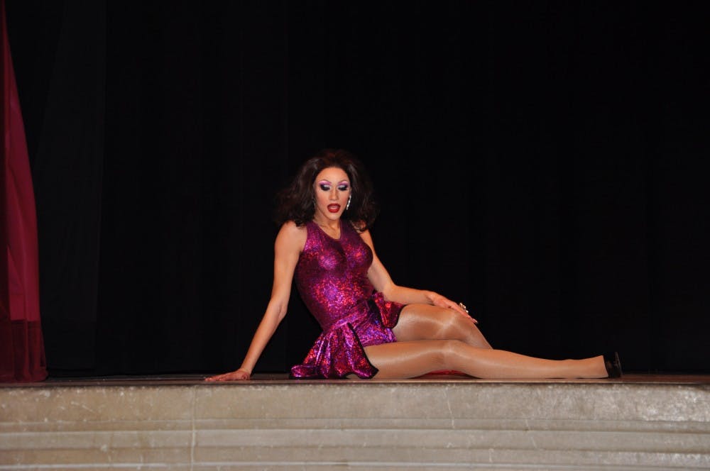 <p>Freshman Ethan Tinsley as&nbsp;Jenna Talia poses on the stage in Alumni Hall at the Indiana Memorial Union. Life's a Drag (Race) drew a crowd of over 450 to watch the queens dance and lip sync to artists like Lady Gaga and Nicki Minaj.</p>
