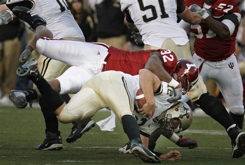 IU defensive lineman Greg Middleton tackles a Purdue player Saturday, Nov. 18, 2007 at Memorial Stadium.