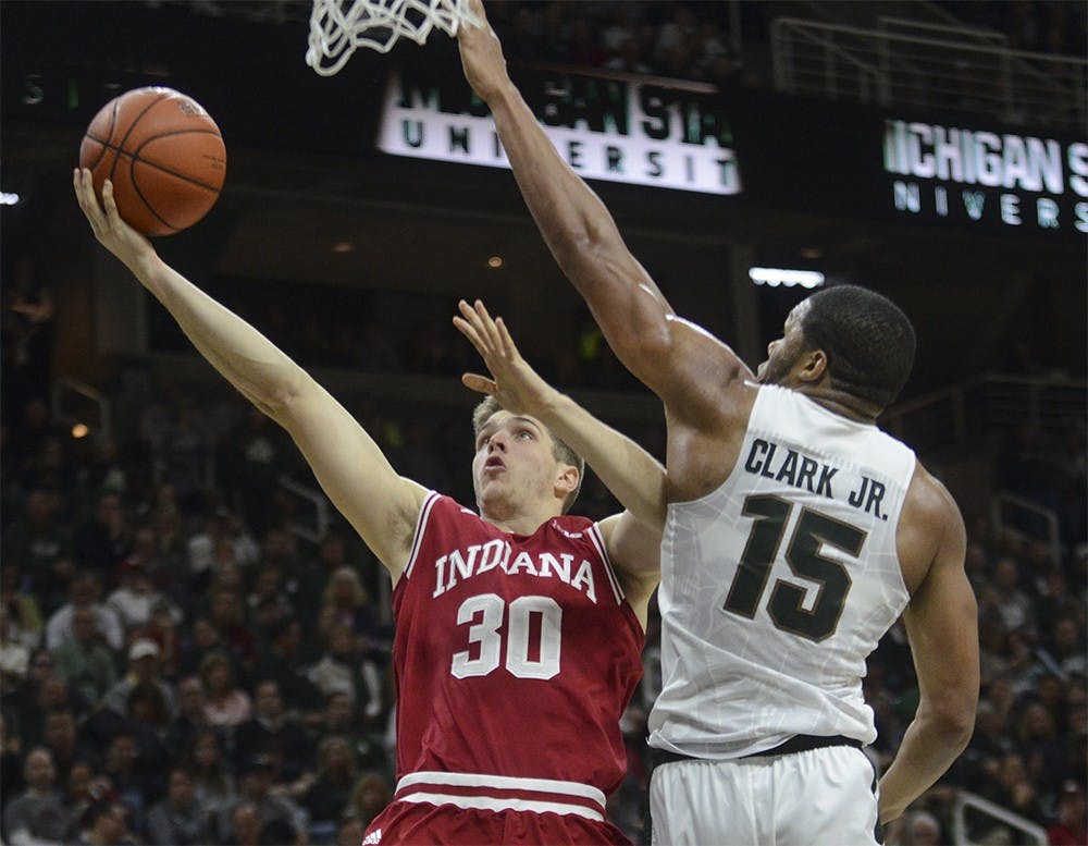 Junior forward Collin Hartman shoots a layup during the game against Michigan State on Sunday at the Breslin Center in East Lansing, Michigan. The Hoosiers lost 69-88.