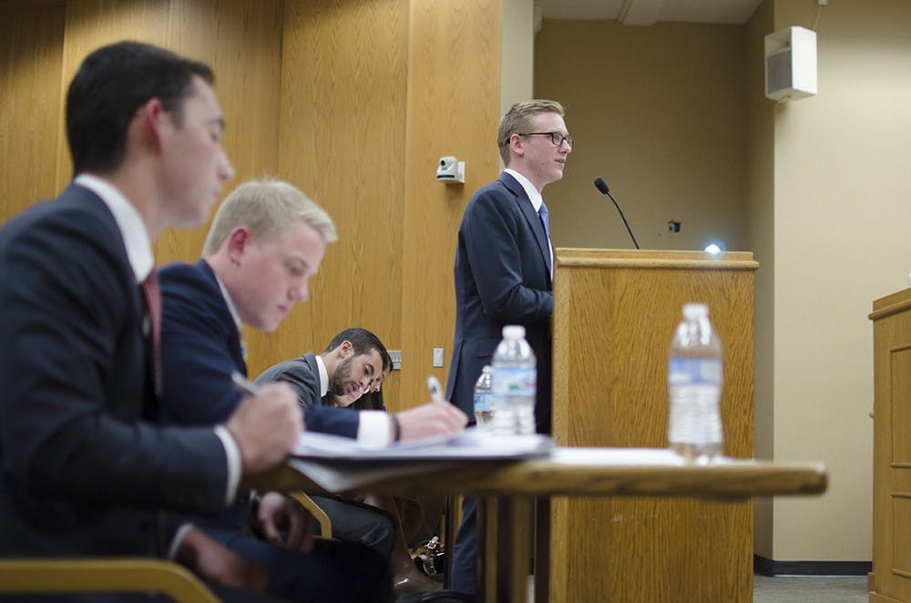 Nick Laszlo, Amplify for IUSA's presidental candidate, Aj Gauthier and Zack Farmer appeal Amplify's disqualification to the IUSA Supreme Court. Amplify was disqualified after winning the election due to failure to report accurate campaign expenditures. 