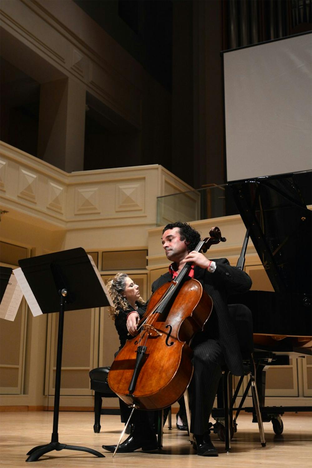 Emilio Colón(front), American solo cellist and well known international artist, perferms "Paccavi Duo" at Auer Concert hall with Wendy Prober,the founding pianist of the award-winning Viklarbo Chamber, on Tuesday evening. 