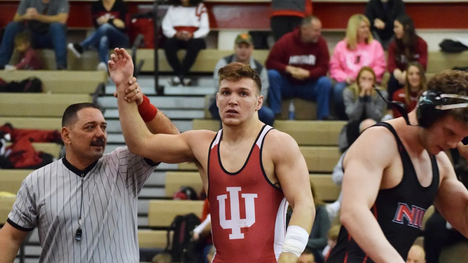 Sophomore Devin Skatzka takes down his opponent with a pin early in the match in the 174-pound category during the Hoosier Duals at the University Gym on Dec. 2. Skatzka finished in eighth place in the 174 lb. division at last week's 55th Ken Kraft Midlands Championships.