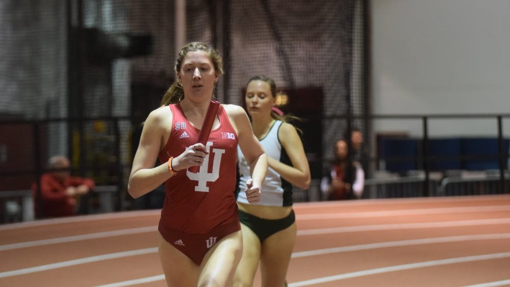 Then-sophomore distance runner Kelsey Harris, now a junior, runs the first leg of the distance medley relay in the Hoosier Hills Invitational on Feb. 10, 2016, in Harry Gladstein Fieldhouse. Harris is currently ranked 8th place in the Big Ten for her performance of 4:26.19 at the Florida Relays and the Stanford Invitational this past weekend.&nbsp;