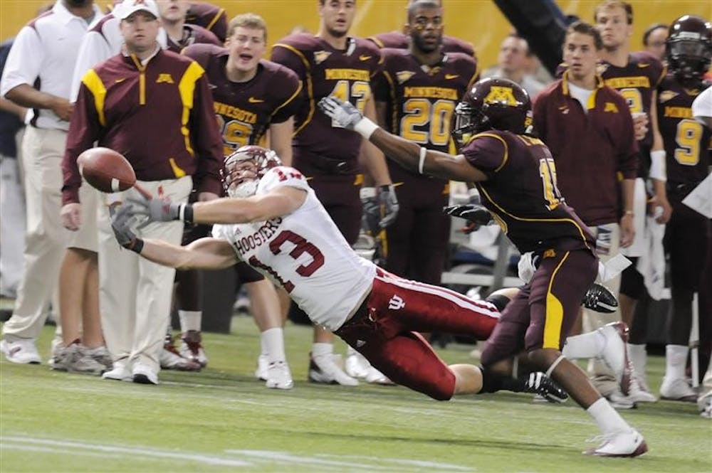 IU wide receiver Andrew Means barely misses a catch during the first half of a game verses Minnesota in the Metrodome in Minneapolis. IU lost 16-7.