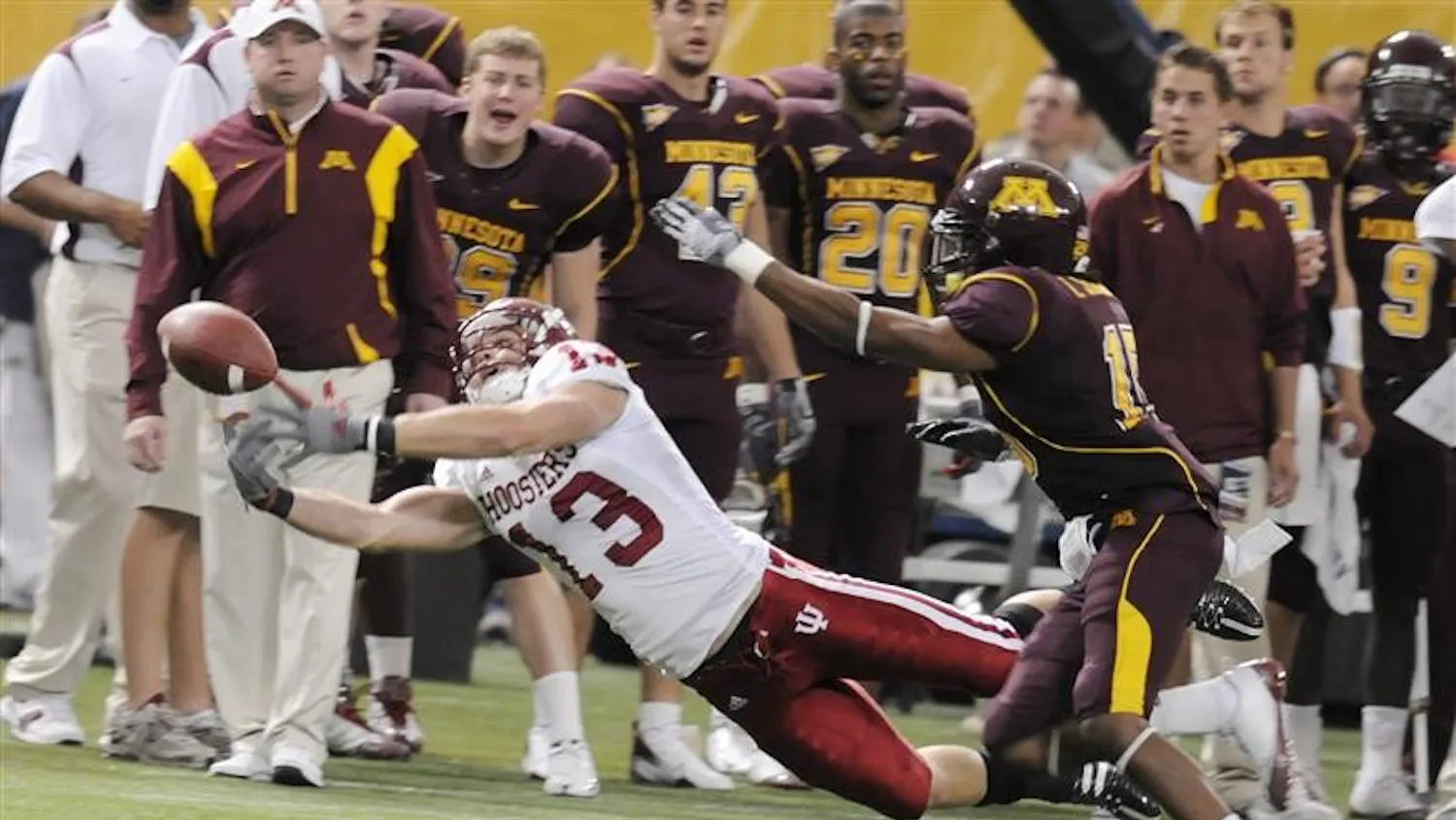 IU wide receiver Andrew Means barely misses a catch during the first half of a game verses Minnesota in the Metrodome in Minneapolis. IU lost 16-7.