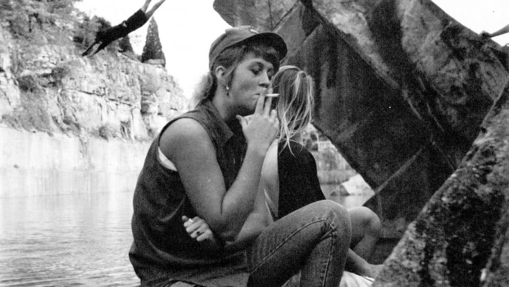 IU students hang out at Sanders quarry in 1993. The quarry was recently filled following years of safety concerns.&nbsp;