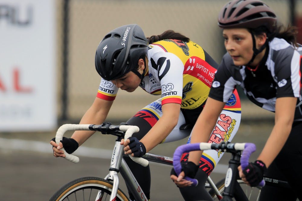 <p>Two women race in heat six during the Individual Time Trials for Little 500. Little 500 qualifiers competed Wednesday to prepare for the races April 20 and 21.&nbsp;</p>