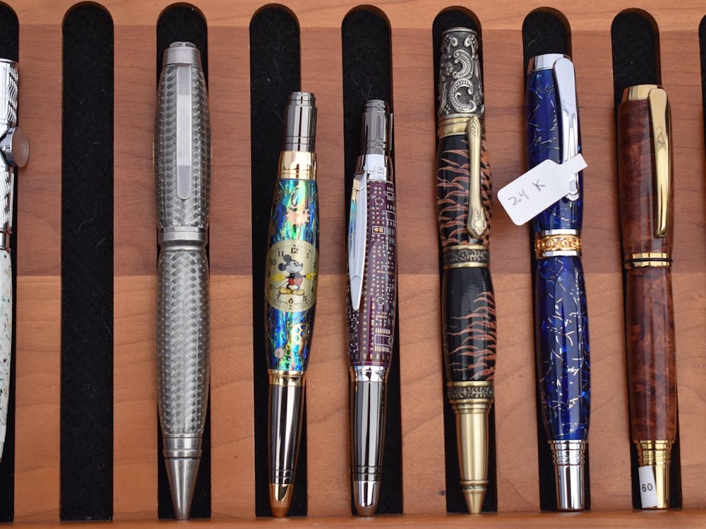 A mickey mouse pen is pictured amongst other pens on September 9, 2023, at &quot;A Fair of the Arts.&quot; The mickey mouse pen was one of Alexis Pruitt’s favorites.