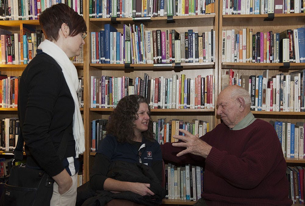 Attendees interacting at IU's GLBT Student Support Services 20th Anniversary on Wednesday.