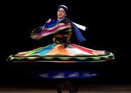 Egyptian choreographer Mohamed Shahin whirls around the Monroe County Library Auditorium stage at the Middle Eastern Arts Festival Children’s Spectacular Feb. 4, 2007. Shahin performed several dances with local Middle Eastern dancer Katya Faris.