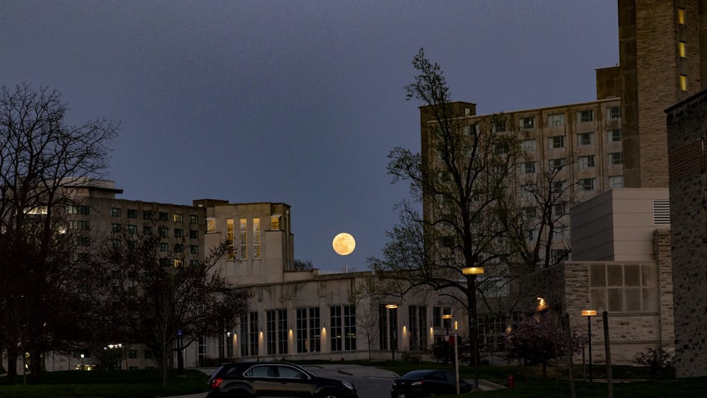 The supermoon shines April 7 above Forest Residence Hall.