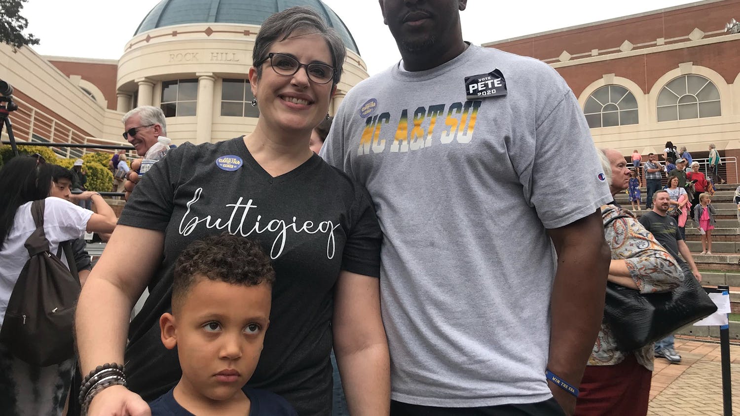Orange County resident Lauren Williams stands with her family Oct. 26 as a Pete Buttigieg supporter. Her husband, Lamont, leans toward former Vice President Joe Biden, but wore a &quot;Pete 2020&quot; for his wife. 