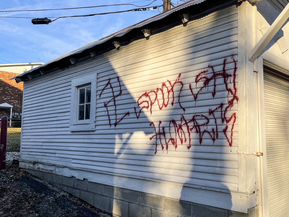A swastika is seen Dec. 13, 2021 on the side of a garage near First and Grant streets. This is the fourth swastika found in Bloomington in the last three weeks.