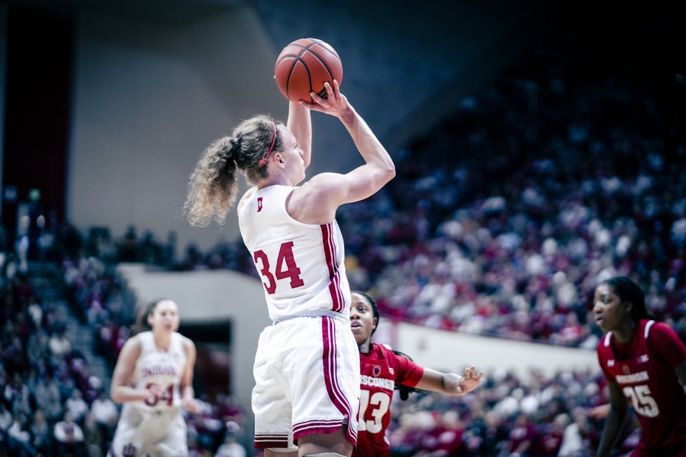 <p>Senior guard Grace Berger takes a jump shot Jan. 15, 2023, at Simon Skjodt Assembly Hall in Bloomington. The Hoosiers beat Michigan 93-82 in Ann Arbor on Monday night.</p>