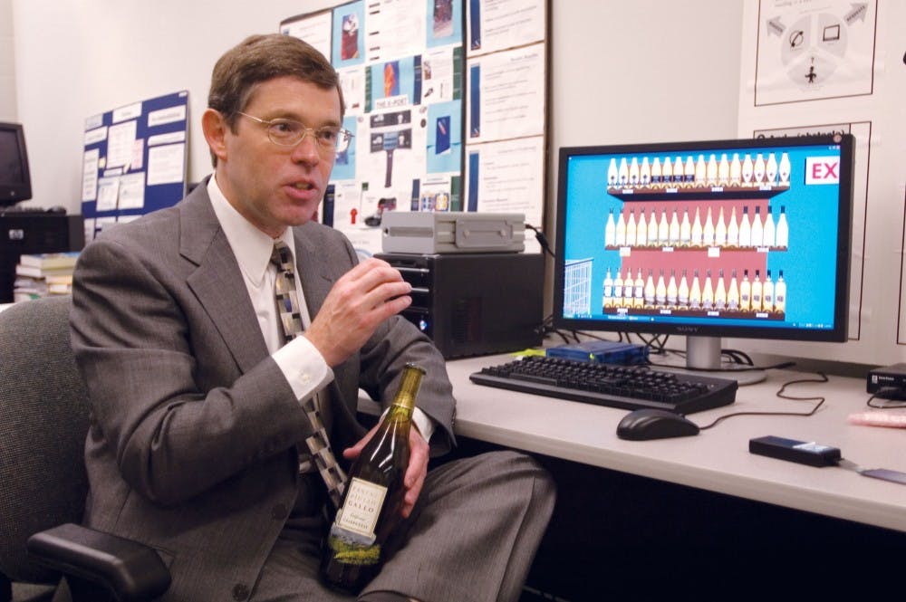 Professor Raymond Burke demonstrates a product comparison program Saturday afternoon at the Kelly School of Business. It was developed to test which product a shopper would select at a convience store. Burke coined the term “shoppability” to describe this process.