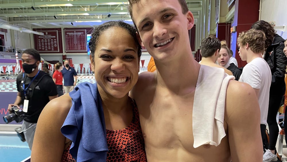 Indiana divers graduate student Kristen Hayden and freshman Quinn Henninger pose for a photo Dec. 13, 2021, at Counsilman-Billingsley Aquatics Center. Four Indiana swimmers and divers were on the Big Ten&#x27;s weekly award list Wed. 