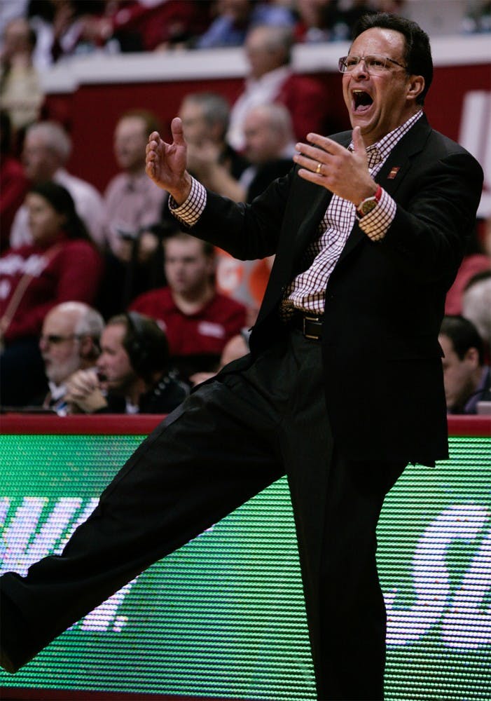 Head coach Tom Crean yells to the crowd to get on their feet to cheer on the Hoosiers Tuesday at Assembly Hall.