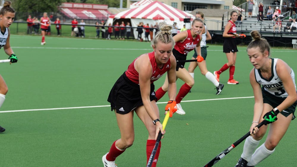 Then-sophomore midfielder Anna Gwiazdzinski runs with the ball during a match against Michigan State University on Oct. 15, 2021, at the IU Field Hockey Complex. Indiana field hockey defeated Ball State University and Bellarmine University this weekend, extending its overall record to 5-2.
