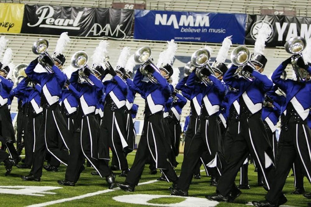 The Blue Devil's hornline performs during the corps' DCI Quarterfinals appearance Thursday night at Memorial Stadium. The corps earned the top score of the evening at 97.375.