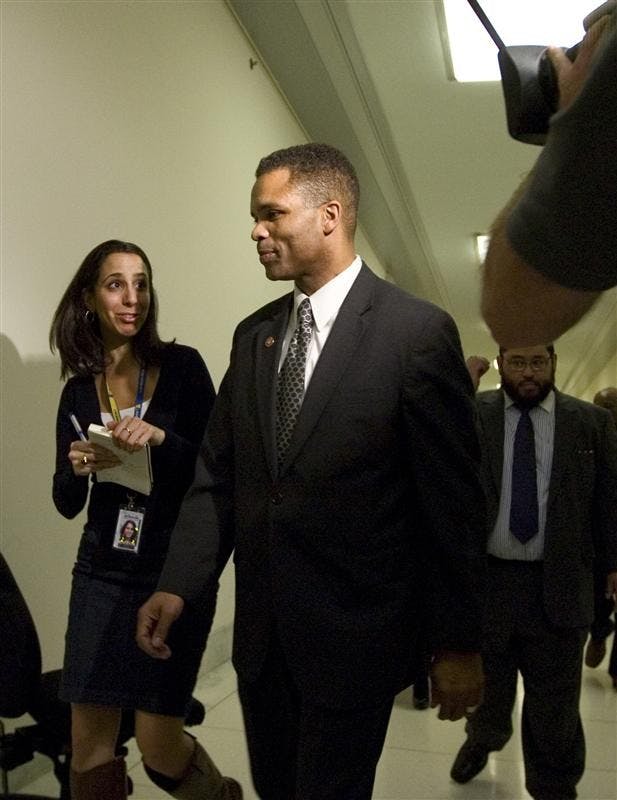 Rep. Jesse Jackson Jr., D-Ill., returns to his office in the Rayburn House Office Building on Capitol Hill after telling reporters he is not a target of the federal investigation of Illinois Gov. Rod Blagojevich, Wednesday in Washington. Wire-tapped conversations indicated that Blagojevich felt that Rep. Jackson could raise campaign money for him in exchange for being appointed to the Senate seat vacated by President-elect Barack Obama. 