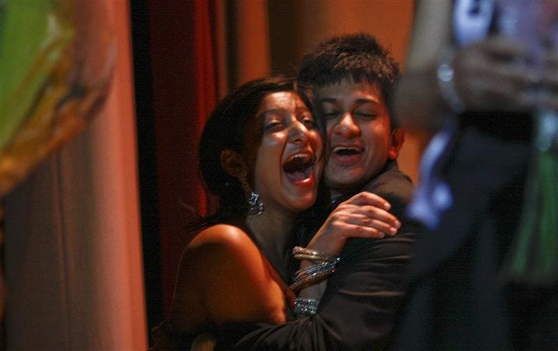 Shah and Jafri, Miss and Mr. Indian and Pakistan, celebrate after being announced Mr. and Miss Asia 2009.