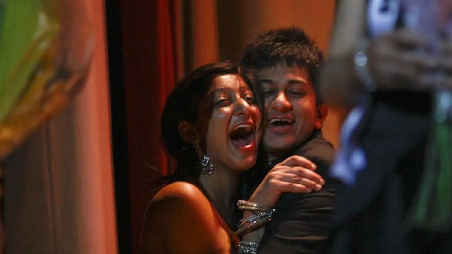 Shah and Jafri, Miss and Mr. Indian and Pakistan, celebrate after being announced Mr. and Miss Asia 2009.
