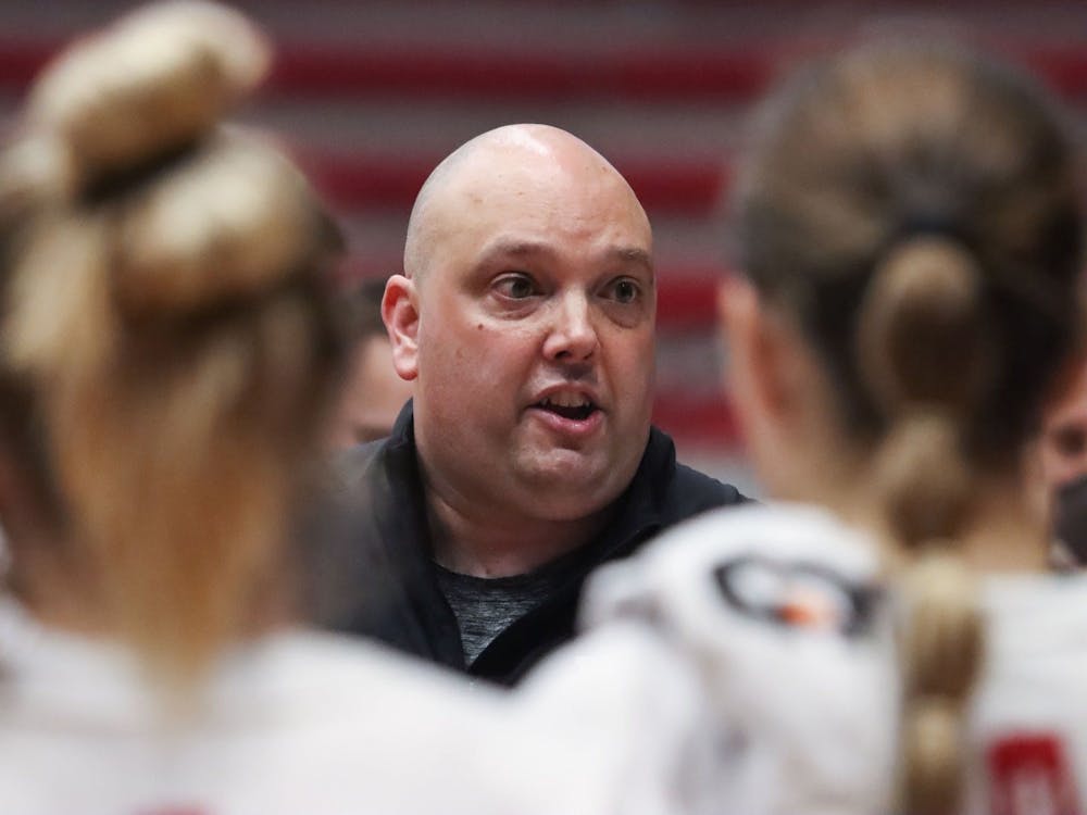 Head coach Steve Aird gives instructions during a timeout Sept. 17, 2021, in Wilkinson Hall. The IU women&#x27;s volleyball team starts its season at 7 p.m. Friday at home against Indiana State University.