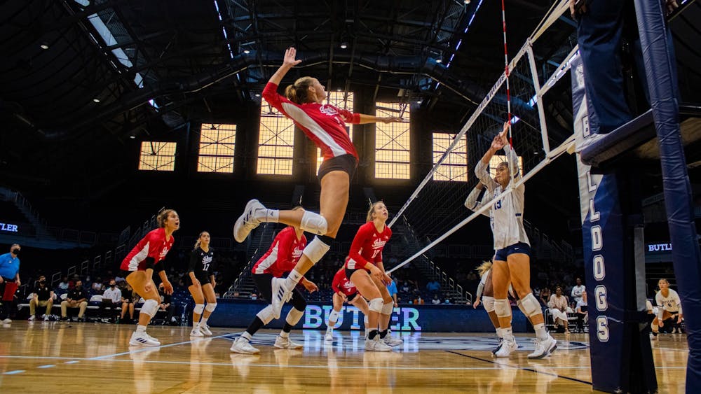 Then-senior Kari Zumach goes for a spike in the game against Butler University on Aug. 28, 2021, at Hinkle Fieldhouse in Indianapolis. IU will play Texas A&amp;M, Tennessee Tech and Western Kentucky University at the Western Kentucky University Invitational this weekend.
