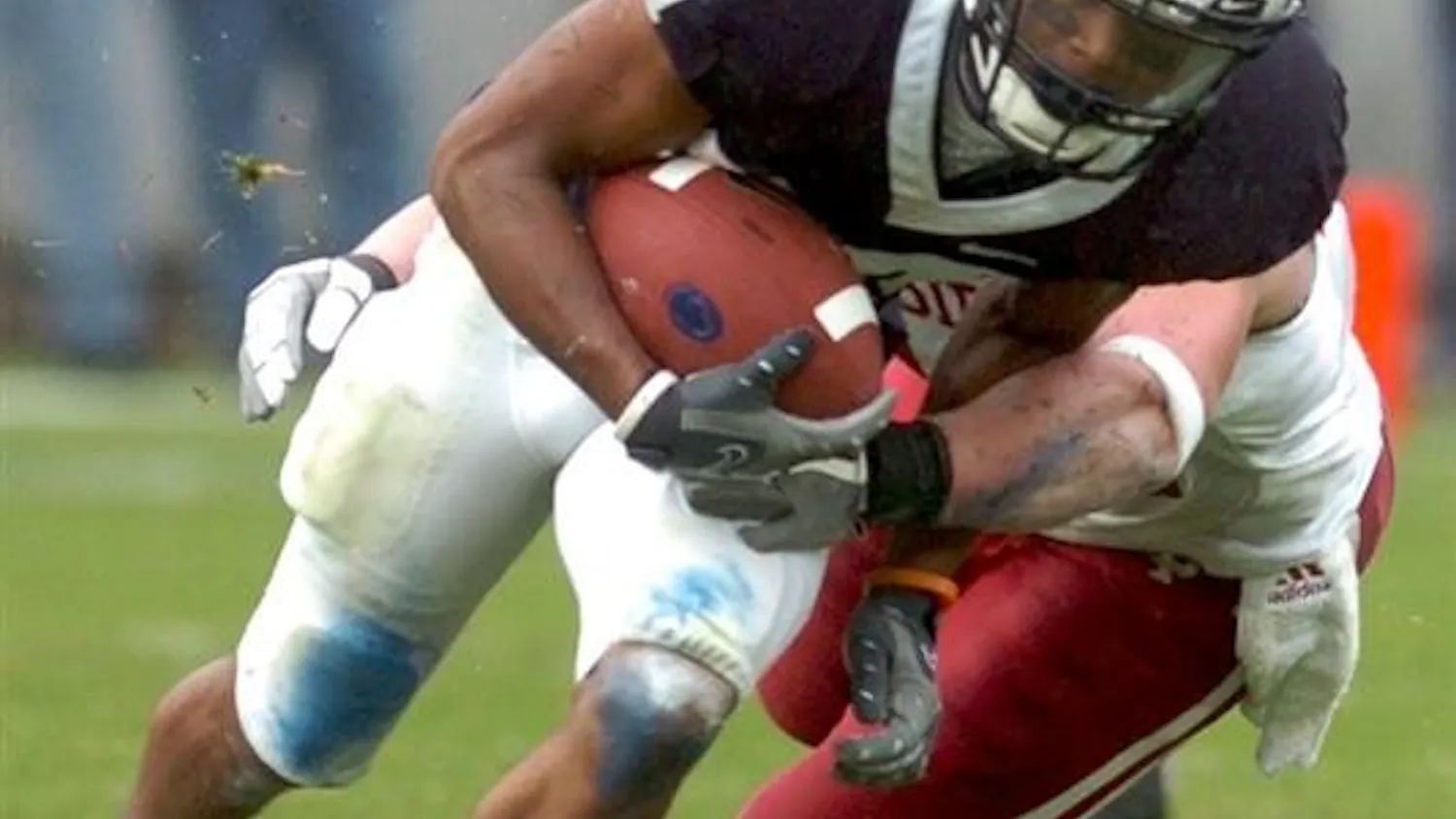 Penn State's Jordan Norwood tries to evade an IU defender in the Nittany Lion's win over IU. The Hoosiers lost to Penn State 34-7 Saturday at Beaver Stadium in State College, Penn.