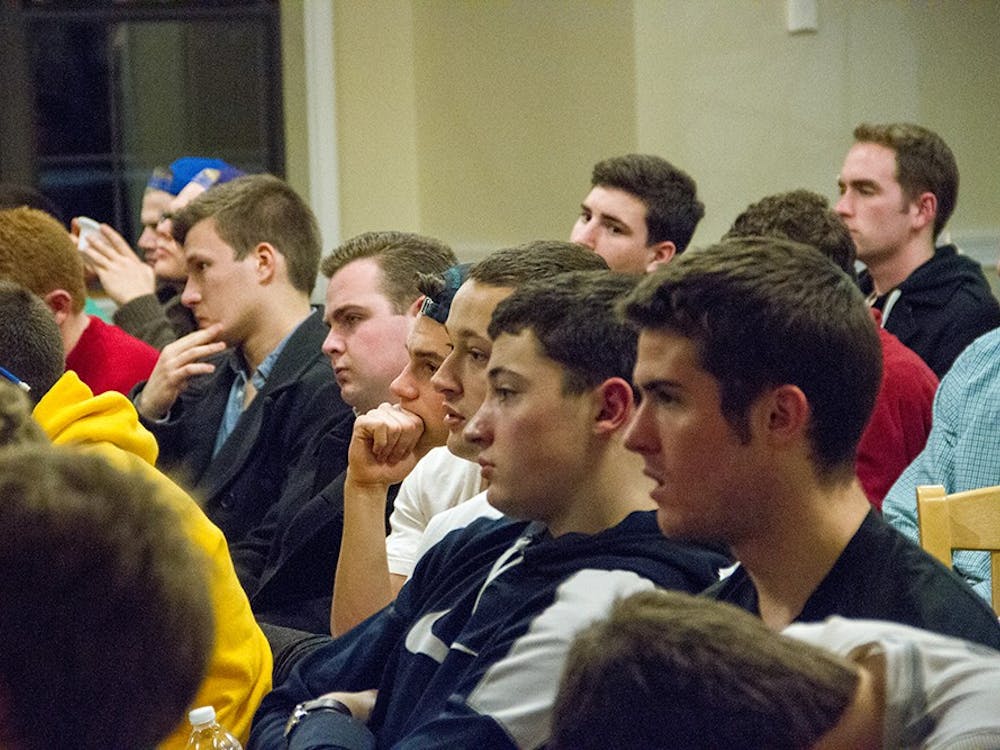 IU male students listen to a training session focused on the response and prevention of rape and sexual assault Monday, Mar. 3, 2014 at Sigma Phi Epsilon, put on by the Interfraternity Council Men Against Rape and Sexual Assault Program (IFC MARS). "At IU, we have a culture where people go hard from Thursday through Saturday. Sometimes things can get ugly... and we do things we regret," said Sean Ndebele IFC Vice President of Membership Development.