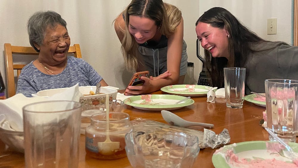 Leila Faraday, her grandmother and her cousin sharing a special moment Aug. 9, 2022, at the dinner table. They spend more time together at the table than anywhere else in the house. 