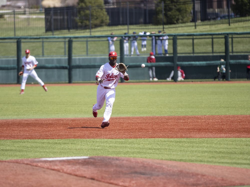 Graduate second baseman Tyler Doanes races to catch a ball against Northwestern on April 2, 2022, at Bart Kaufman Field. Six Indiana baseball players received Big Ten honors Tuesday.