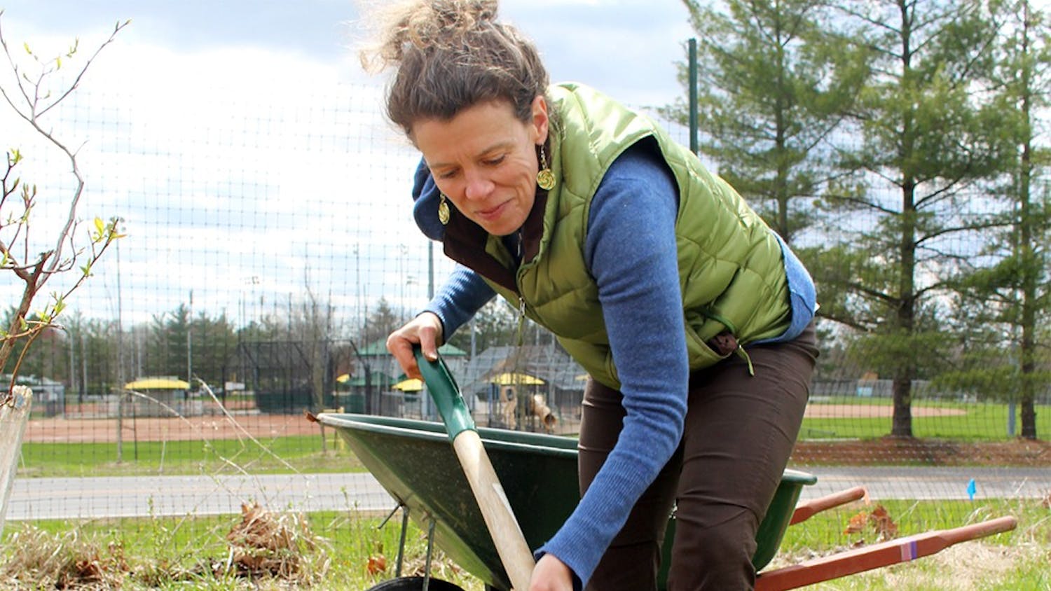 Amy Roche works Apr. 2 in the Bloomington Community Orchard. As the Outreach leader, Roche educates other community groups with similar projects.