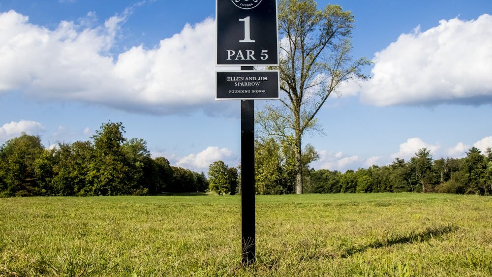 The first hole sign is seen at the Pfau Indiana University Golf Course. IU head coach Mike Mayer said he is hoping to see a more well-rounded tournament this weekend