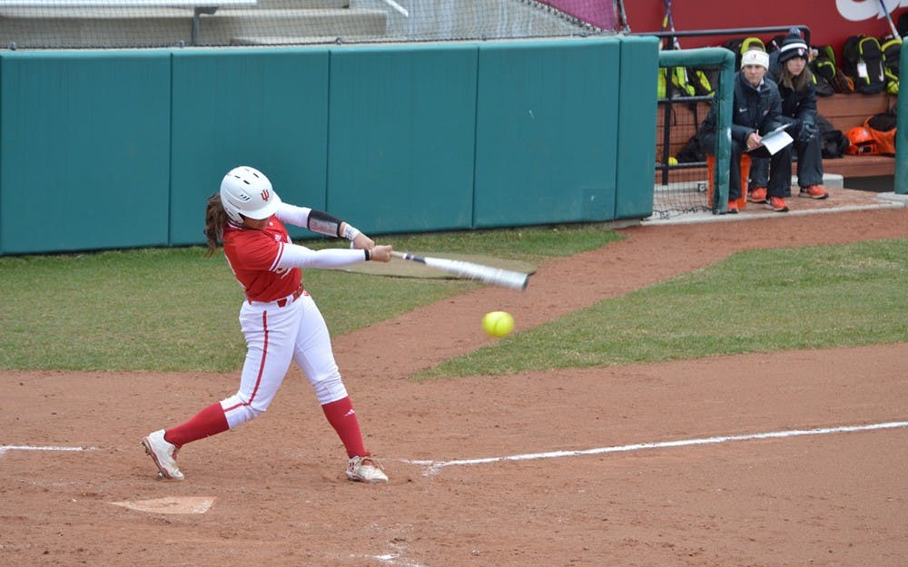 Freshman catcher Bella Norton makes contact with the ball during the first game of the Hoosier Classic on Saturday afternoon.&nbsp;IU beat Bowling Green 11-3.&nbsp;