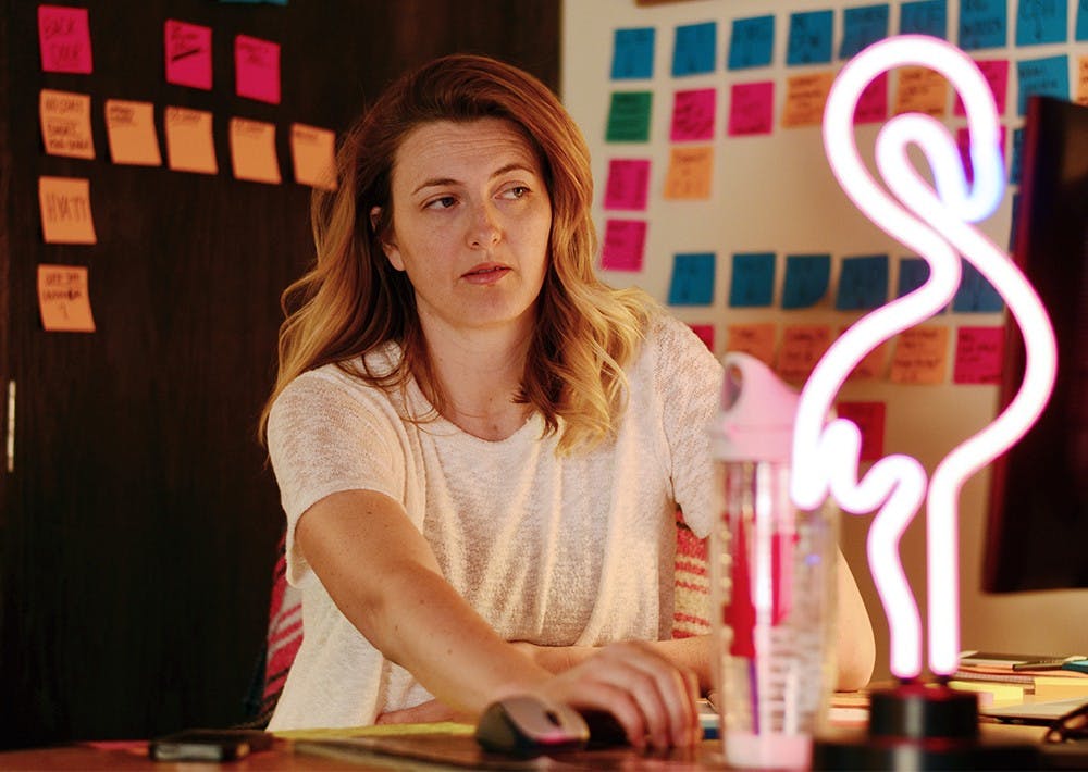 Jessica Levandoski, festival director of the Middle Coast Film Fest, prepares for the screening of "Trapped," film about laws limiting women's reproductive freedoms Monday at Chase Suit 001. 