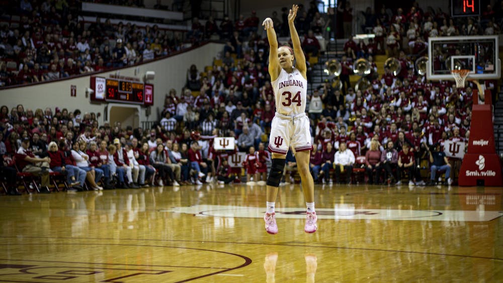 Graduate guard Grace Berger takes a 3-point shot Jan. 29, 2023 at Simon Skjodt Assembly Hall in Bloomington, Indiana. The Hoosiers beat Rutgers 91-68.﻿