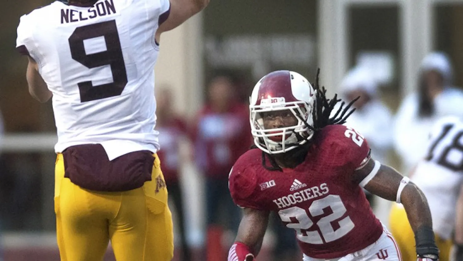 Then-junior cornerback Kenny Mullen pressures Minnesota's quarterback during IU's homecoming game Nov. 2, 2013, at Memorial Stadium.