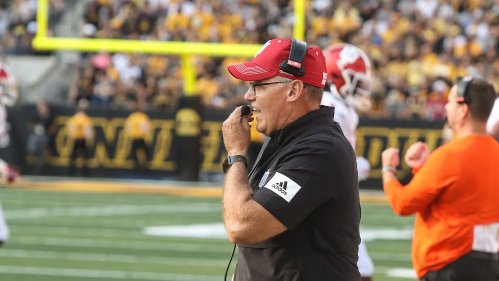 Head coach Tom Allen calls a play Sep. 4, 2021, in Kinnick Stadium in Iowa City. Indiana football will kickoff against Rutgers at noon.