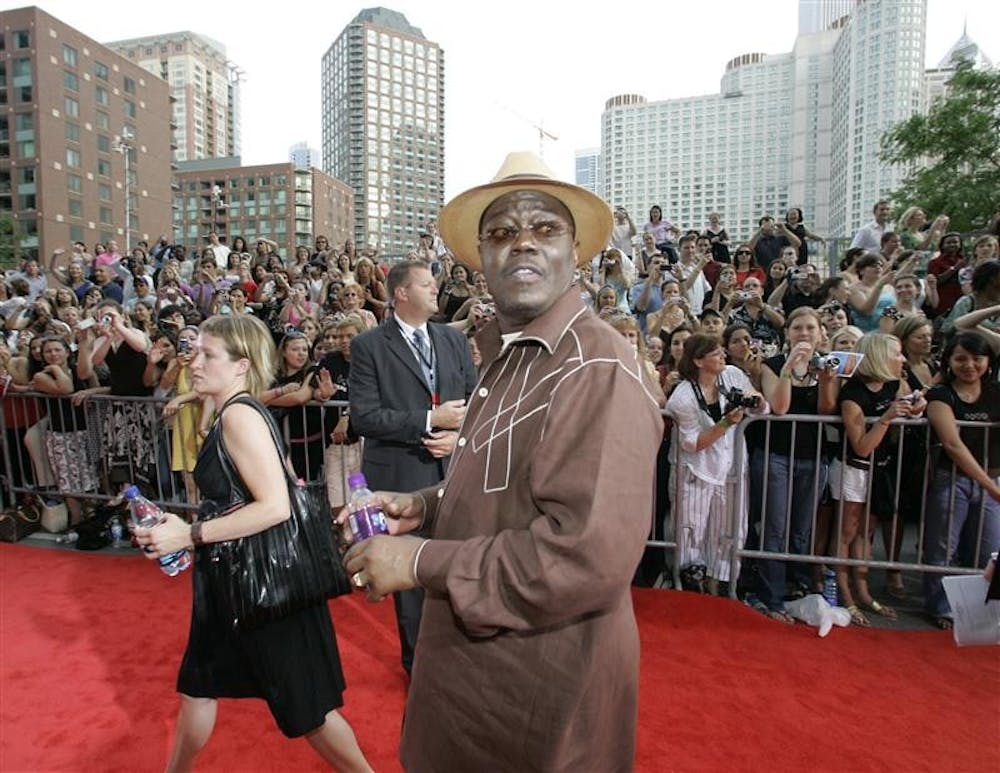 In this Thursday, June 7, 2007, file photo, actor Bernie Mac walks the red carpet at a movie premiere of Ocean's Thirteen in Chicago. Mac's publicist says Saturday the actor and comedian has died.