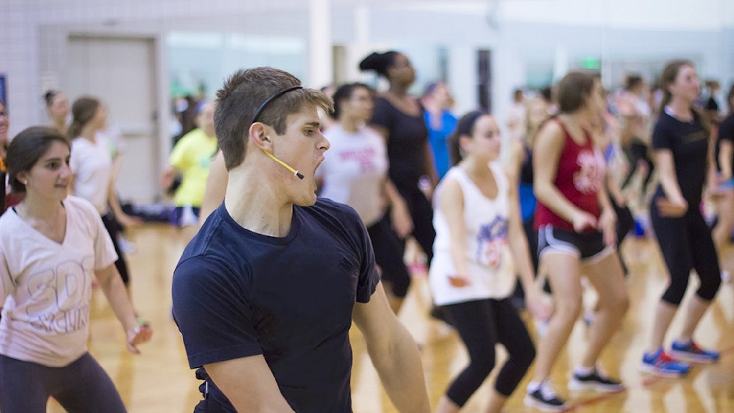 Caleb Marshall leads a Cardio Hip Hop session at the Student Recreational Sports Center in 2014.