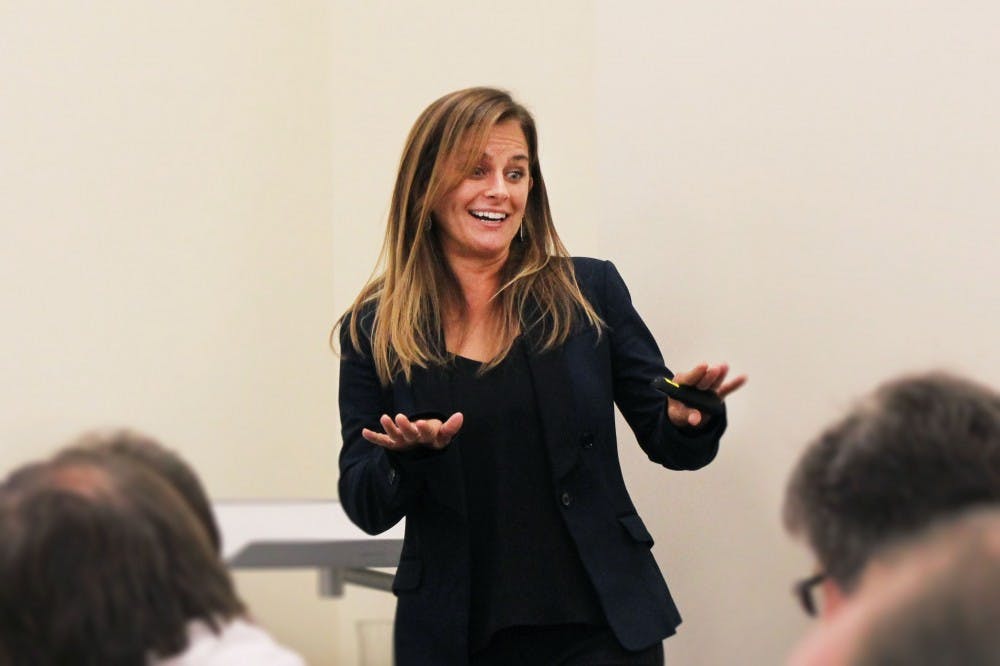Humane Society director of food and nutrition Karla Dumas makes several jokes before beginning her presentation at the Big Ten Chefs Summit on Oct. 7 in Read Residence Hall. The presentation discussed healthy plant-based food options at IU. 