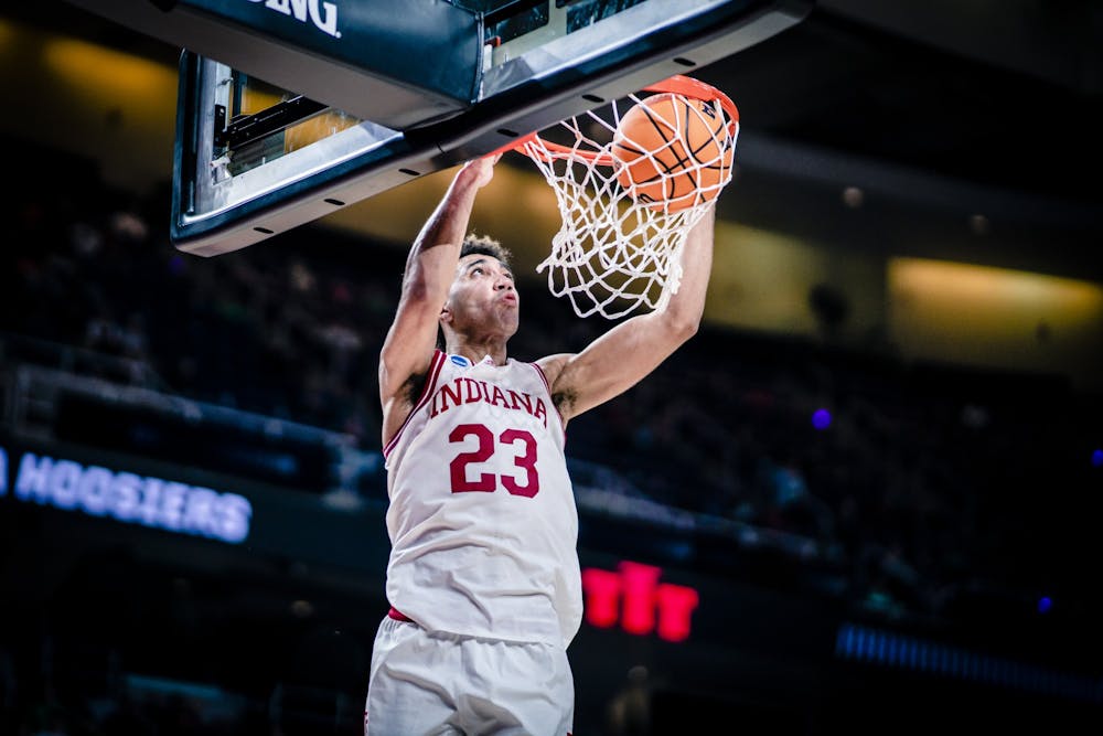 <p>Senior forward Trayce Jackson-Davis dunks March 17, 2023, at MVP Arena in Albany, New York. Indiana defeated Kent State 71-60.</p>
