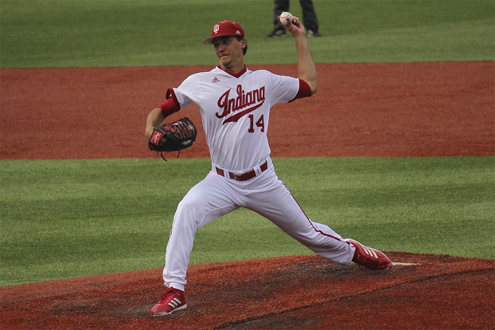 Senior left-handed pitcher Kyle Hart pitches during the fourth inning of play in the first game against Northwestern Apr. 29, 2016. The Hoosiers won the game 2-1.